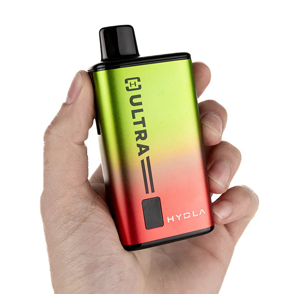 Hyola Ultra 30k Prefilled Pod Kit held in hand, vibrant design with green and red gradient finish.